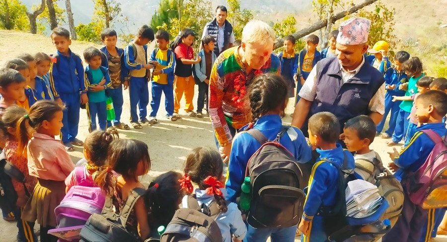 Engaging with students during a lively interaction.