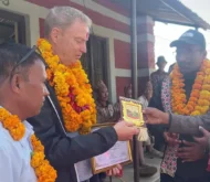 Anthony Peter Cox receiving a token of love.